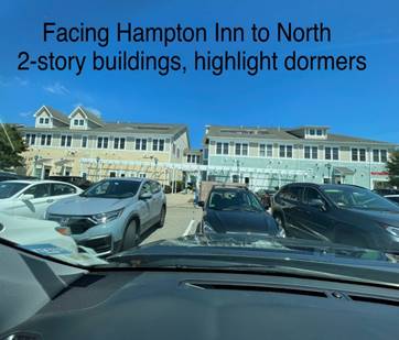 A group of cars parked in a parking lot

Description automatically generated with low confidence